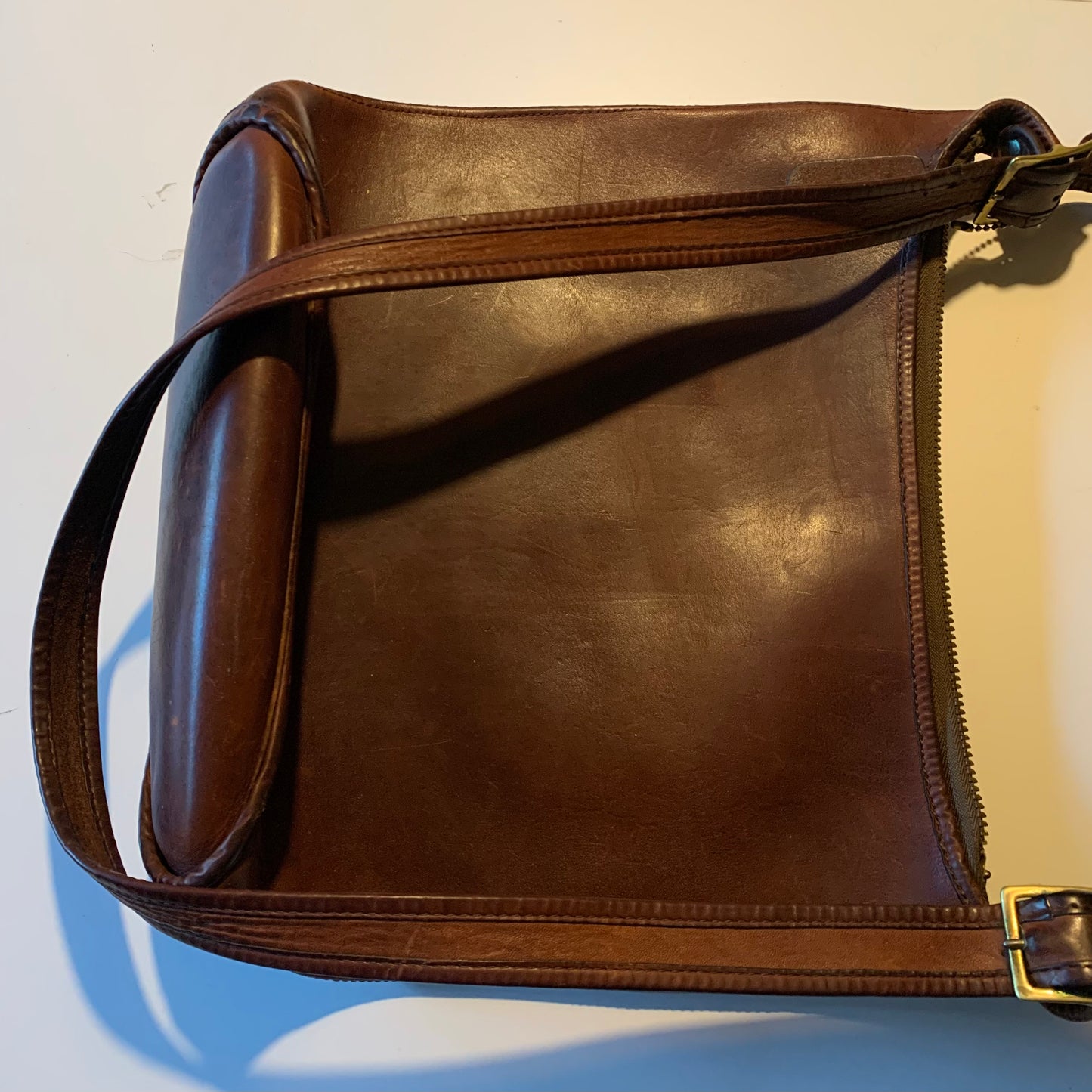 Large Mahogany Heavy Leather Cross Body Buckle Strap Handbag circa 1970s