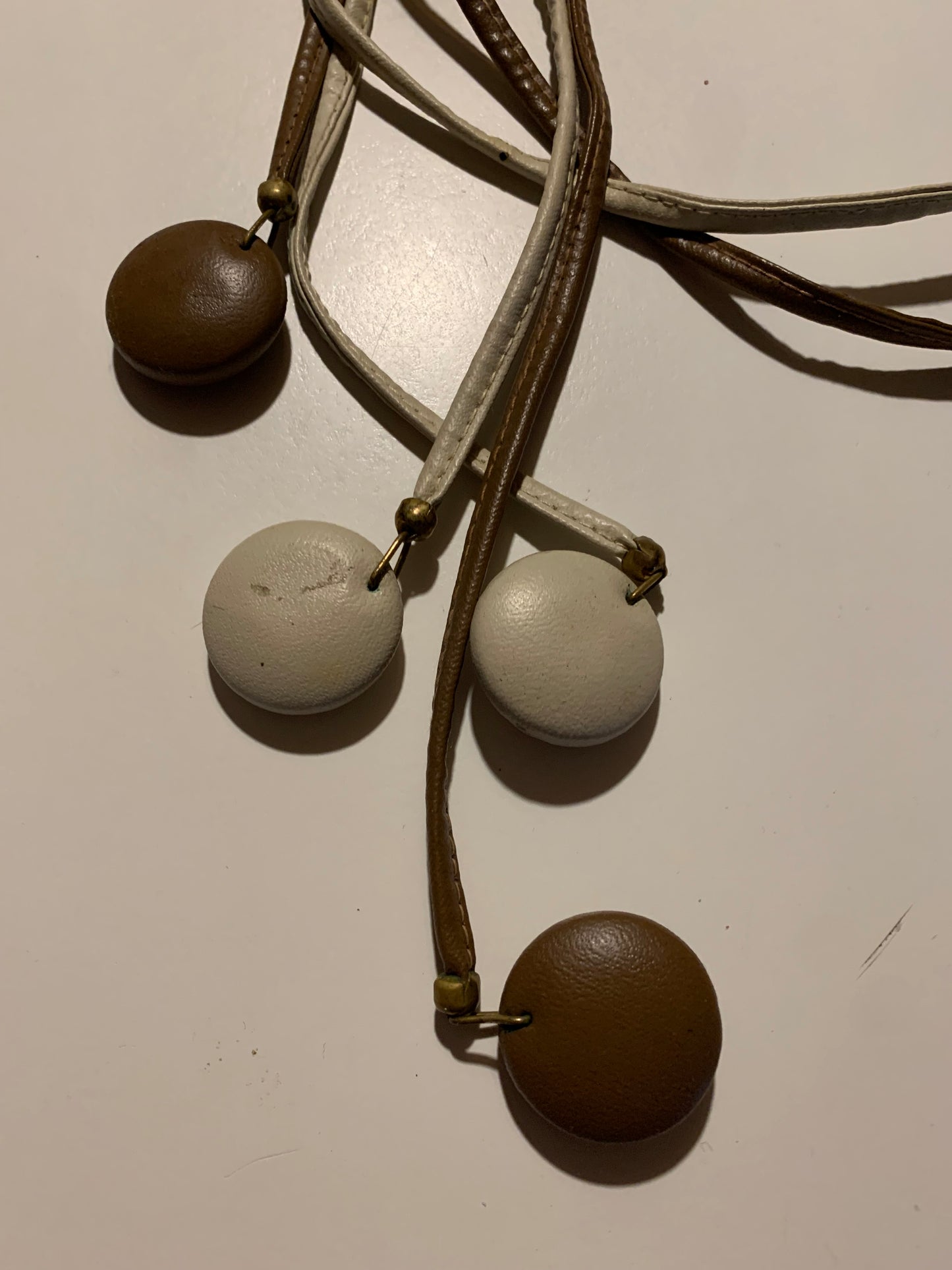 Set of Leather Cord Belts with Leather Circle Fobs circa 1980s