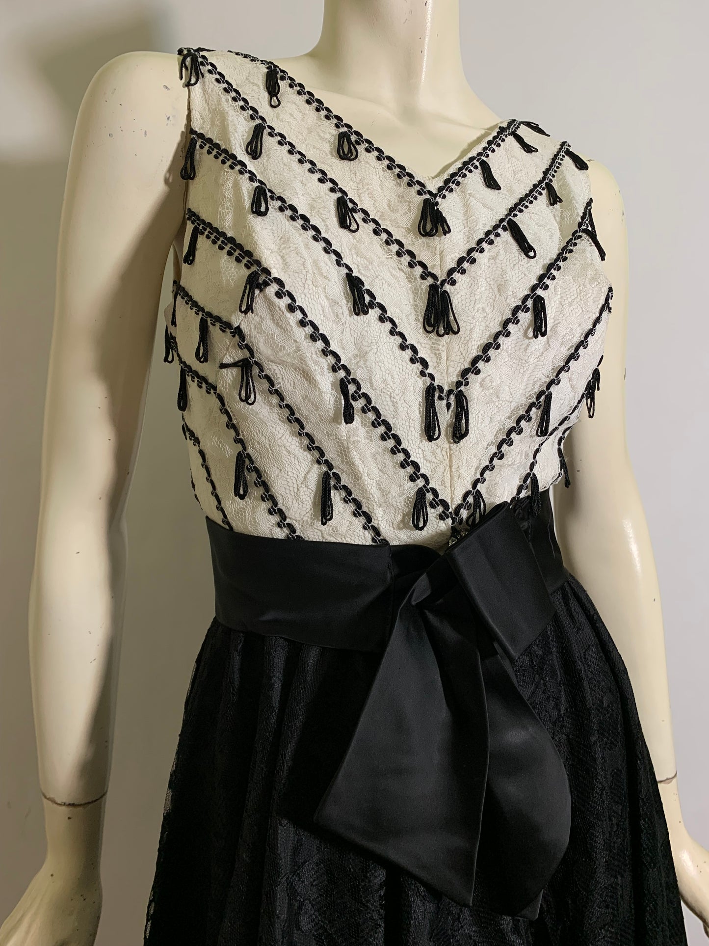 Sassy Little Black and White Mini Cocktail Dress with Loop Tassels on Lace Bodice circa 1960s