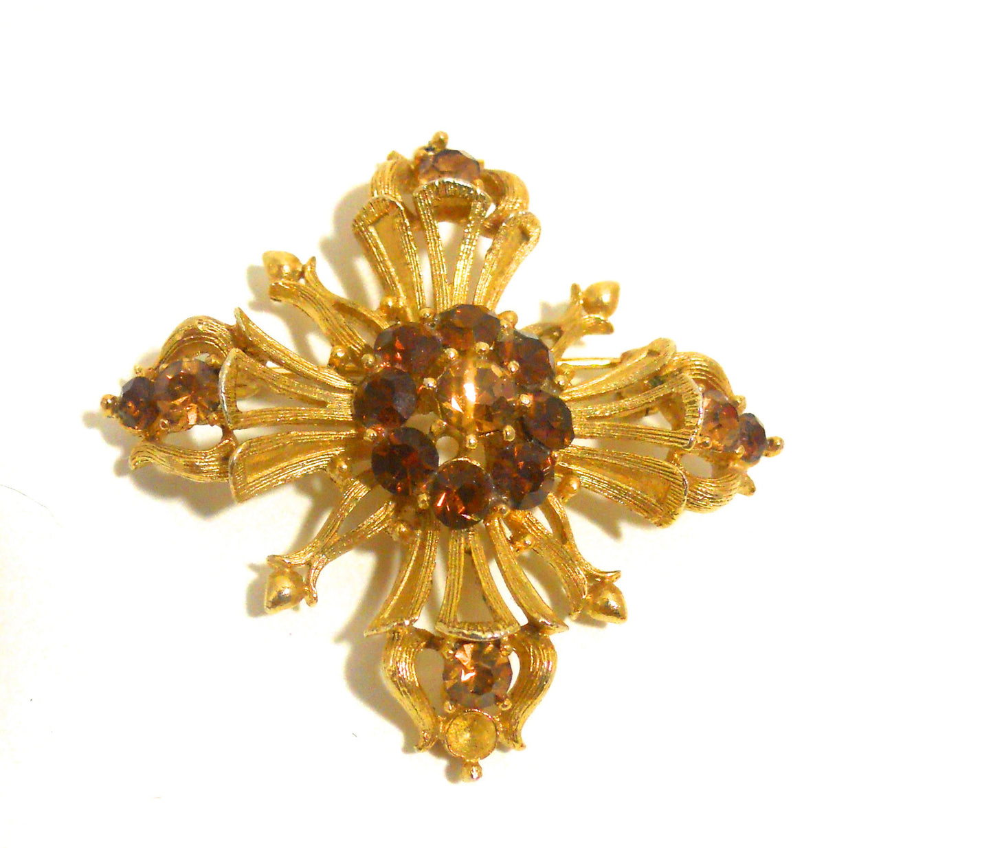Topaz Hued Rhinestone Dotted Cross 1960s Pin