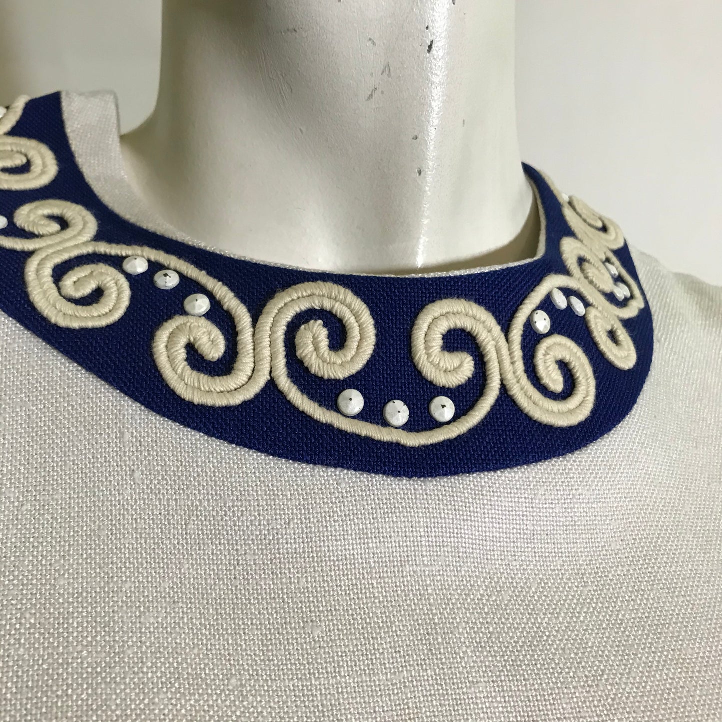 Sleeveless White Linen Weave Rayon Shift Dress with Blue and White Beaded Trim circa 1960s
