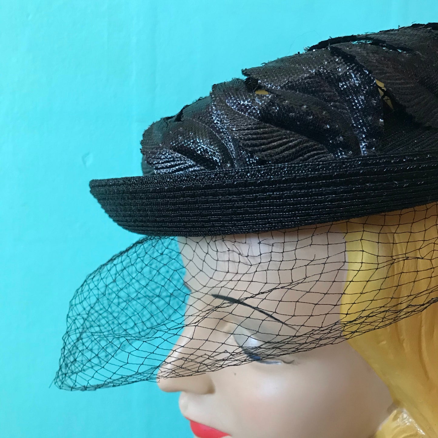 Black Narrow Brimmed Boater Style Hat with Flame Shaped Leaves on Open Top circa 1960s