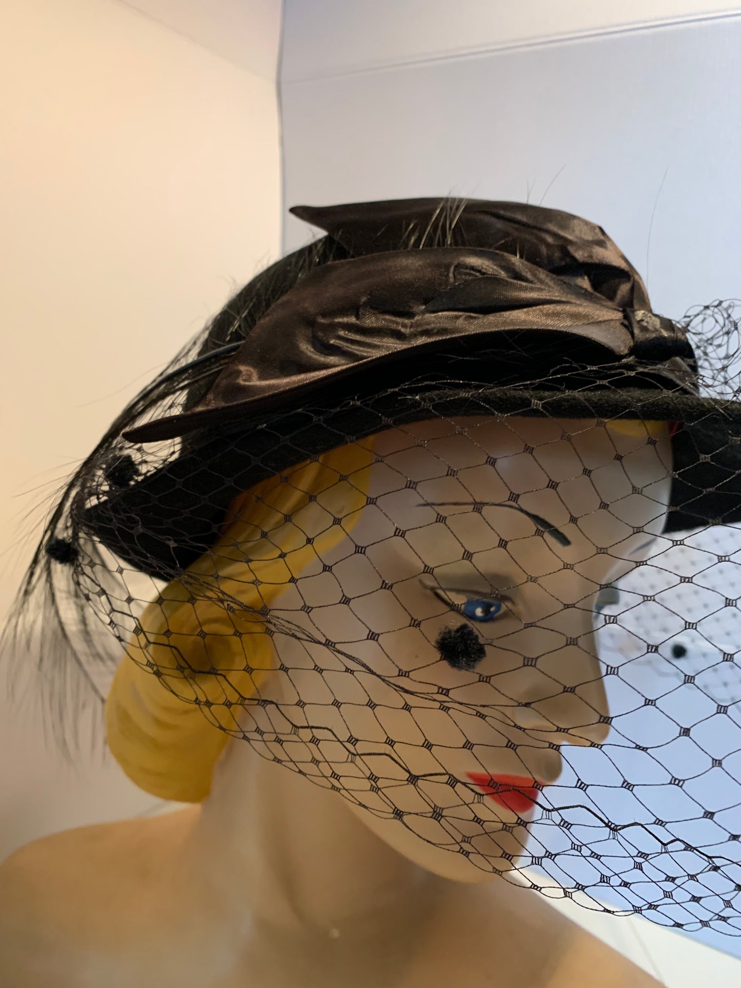 Noir Diva Black Bowler Style Hat with Dotted Netting, Bow and Feather circa 1960s