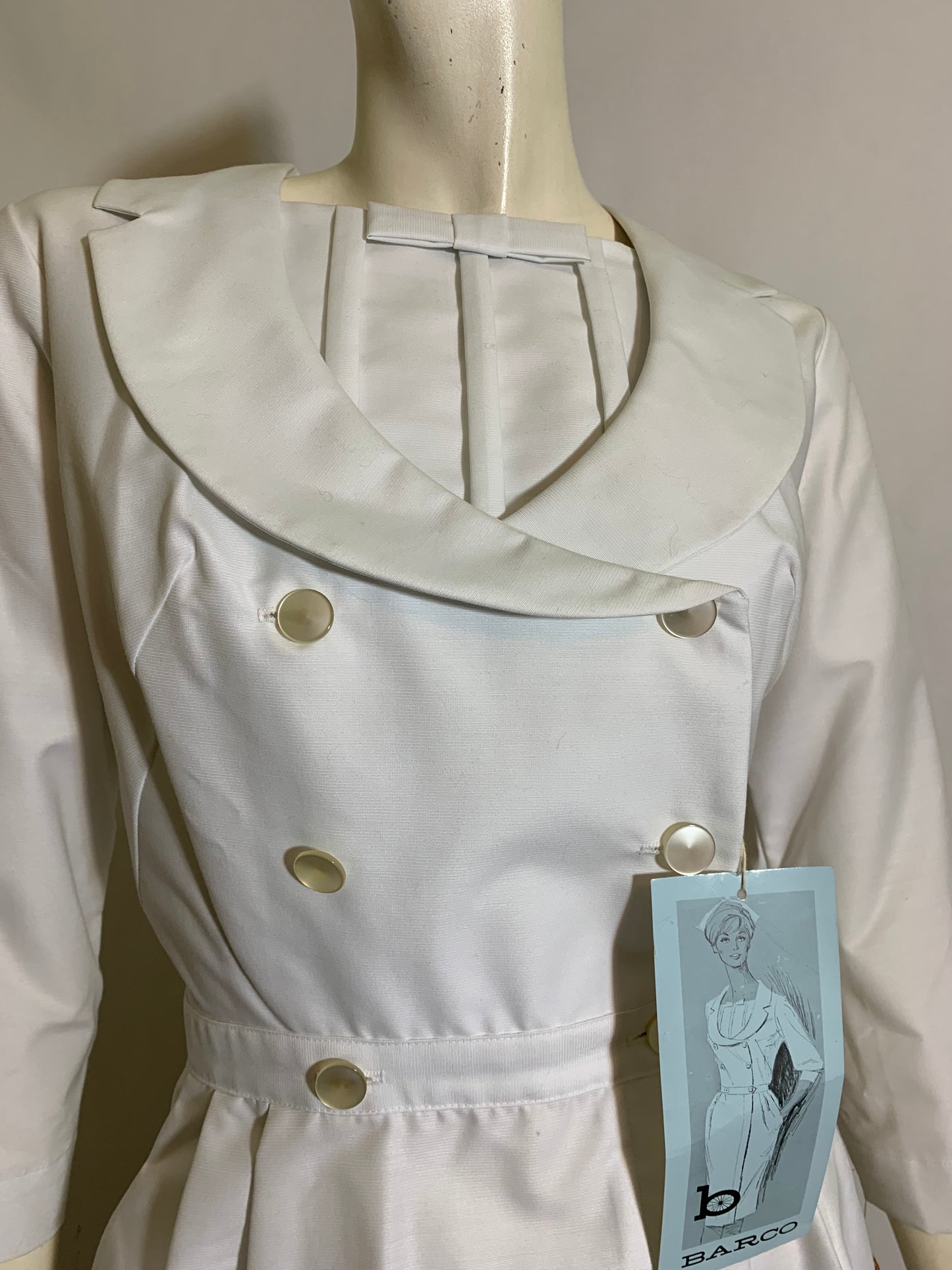 Crisp White Curve Conscious Nurse Uniform with Bow circa 1960s