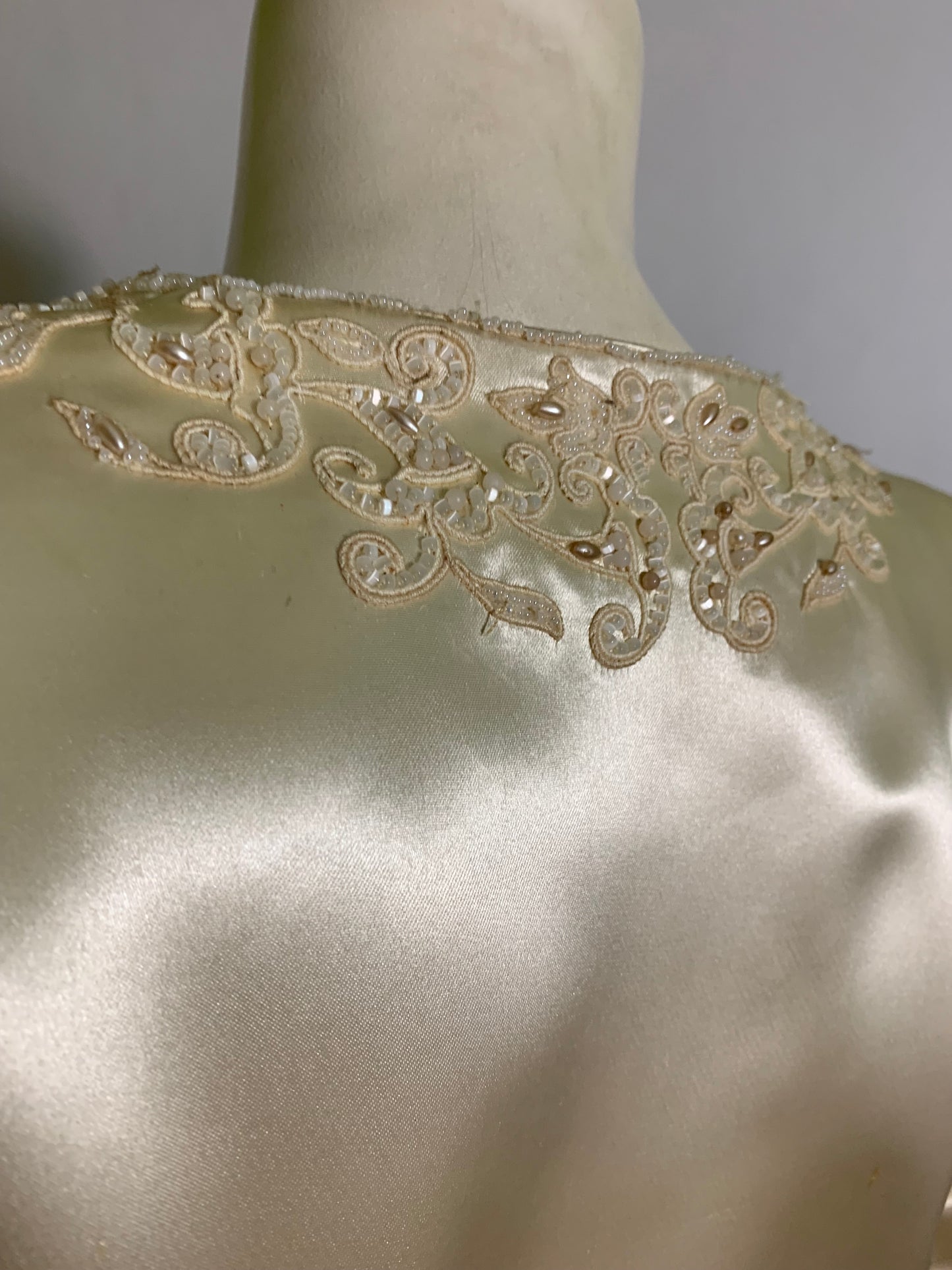 Winter White Slipped Satin Wedding Dress with Beaded Neckline and Hip Accents circa 1940s