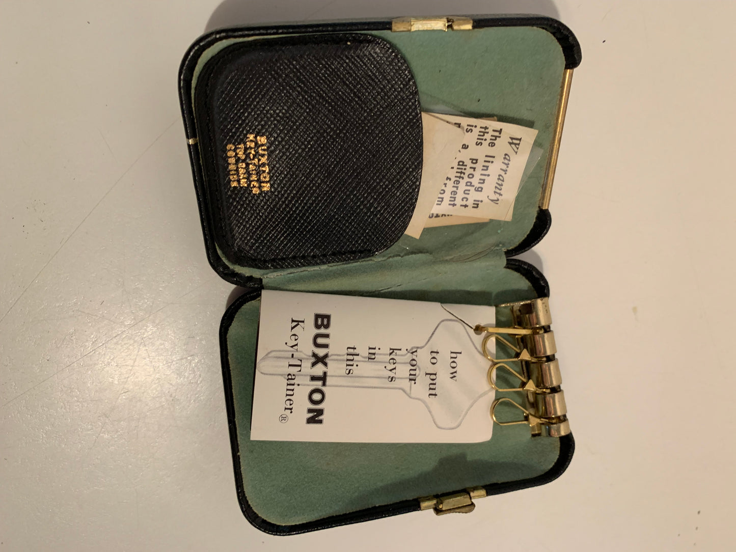 Black Hard Side Key-Tainer Key Case with Daisies circa 1970s