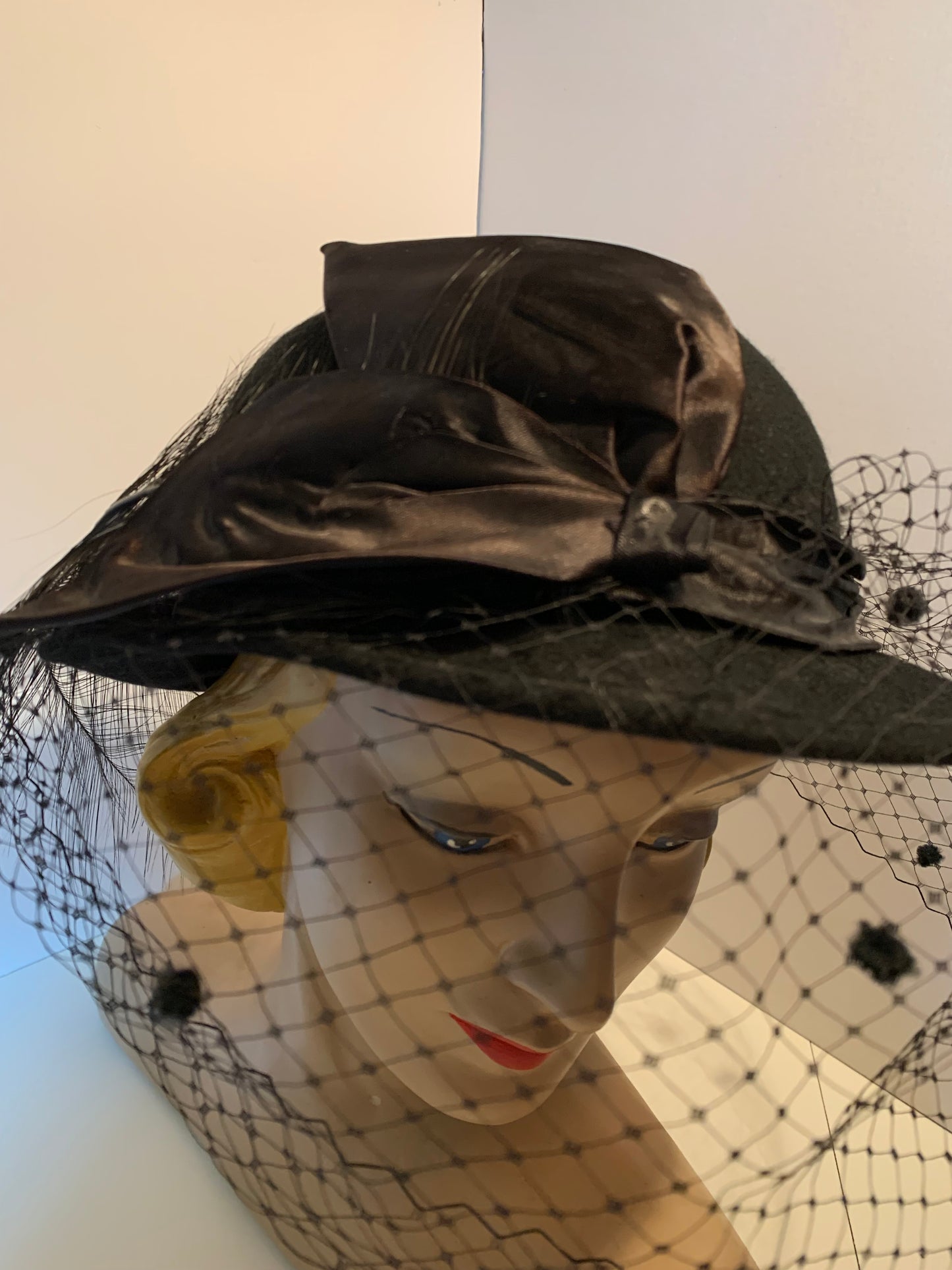 Noir Diva Black Bowler Style Hat with Dotted Netting, Bow and Feather circa 1960s