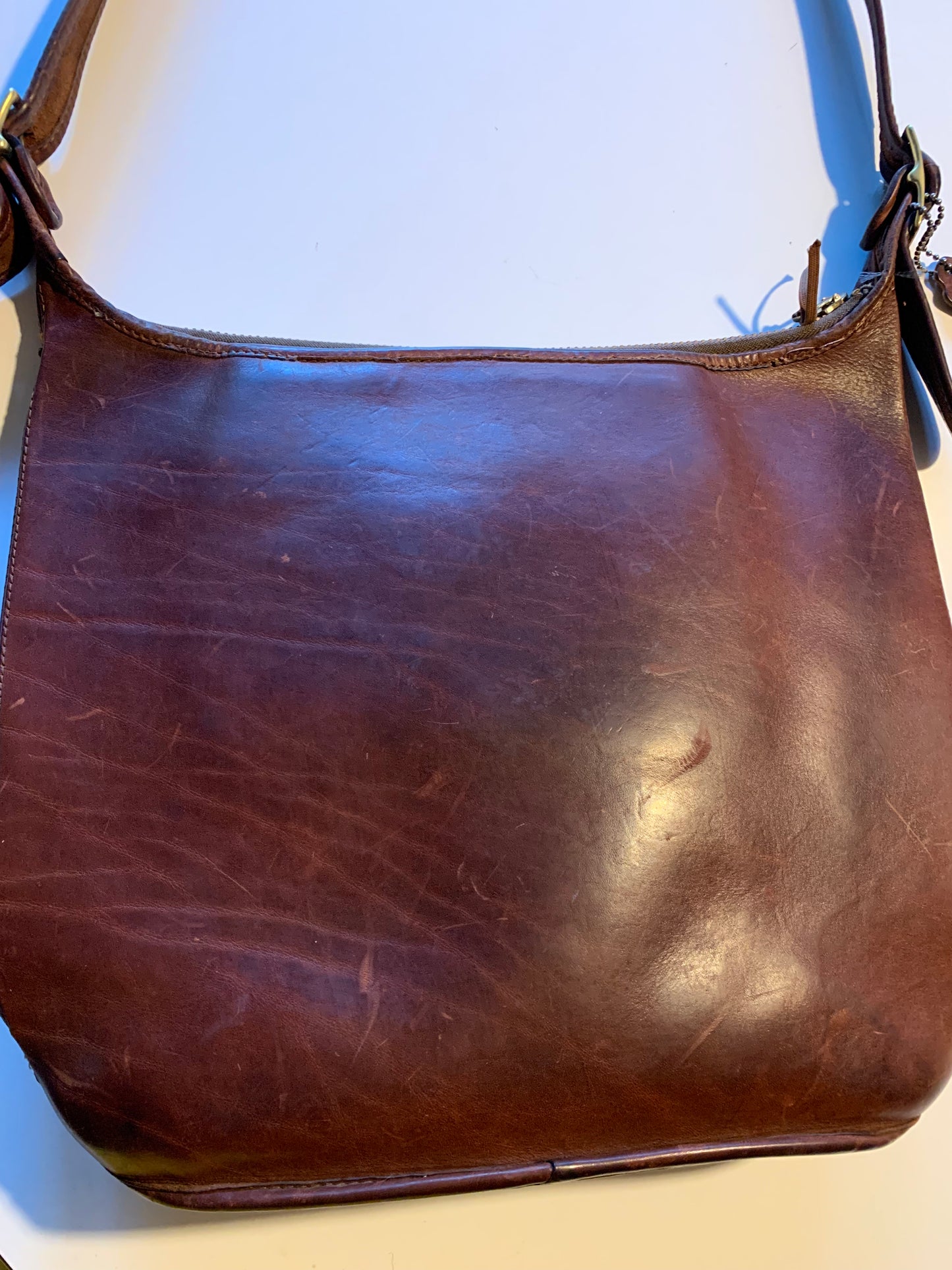 Large Mahogany Heavy Leather Cross Body Buckle Strap Handbag circa 1970s