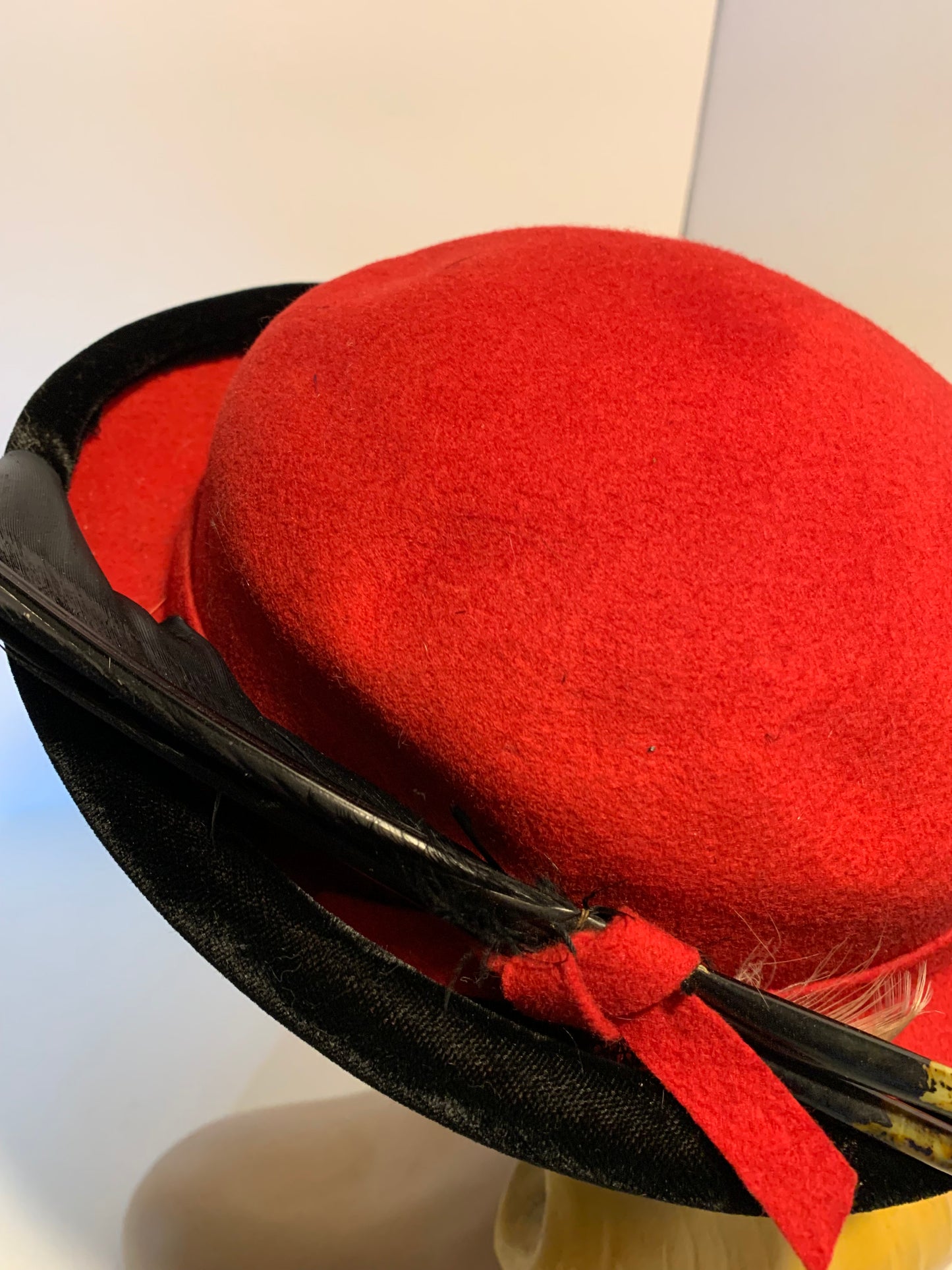 Red Felted Wool Mini Bowler Hat with Black Feather circa 1940s