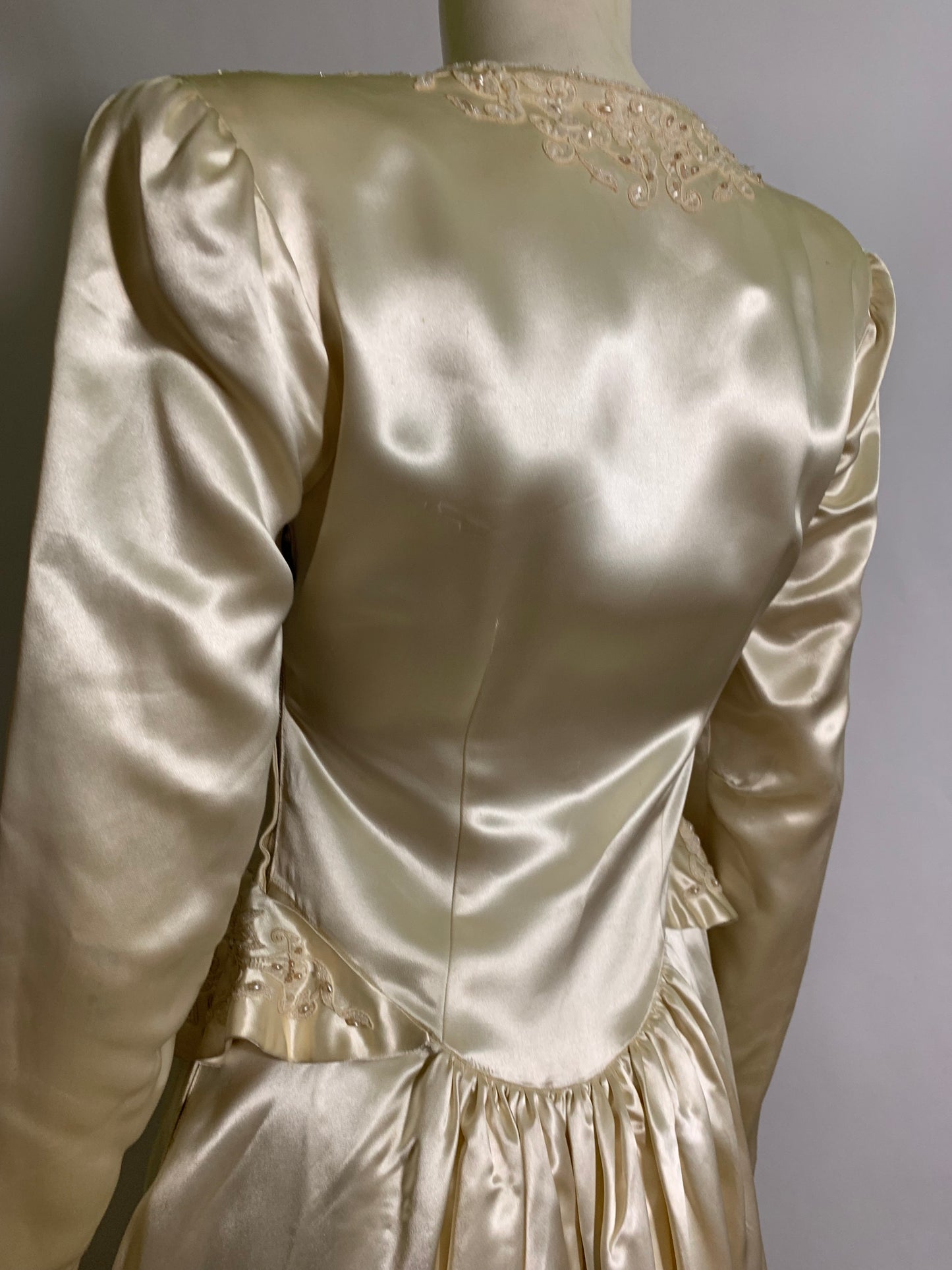 Winter White Slipped Satin Wedding Dress with Beaded Neckline and Hip Accents circa 1940s