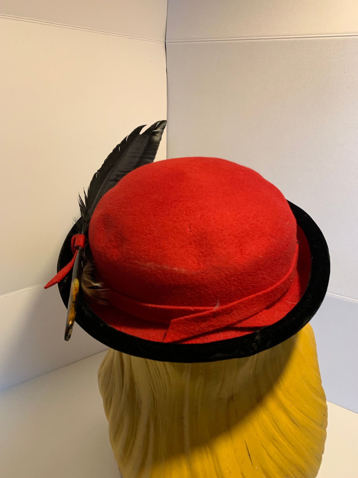 Red Felted Wool Mini Bowler Hat with Black Feather circa 1940s