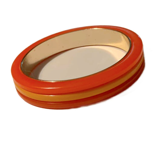 Stacked Orange and Yellow Bakelite Bangle Bracelet Laminated to Metal circa 1940s