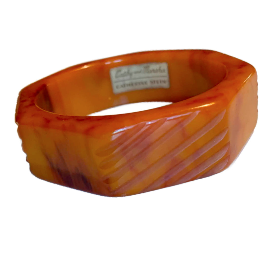 Fiery Burnt Orange Carved and Beveled Bakelite Bangle Bracelet circa 1940s