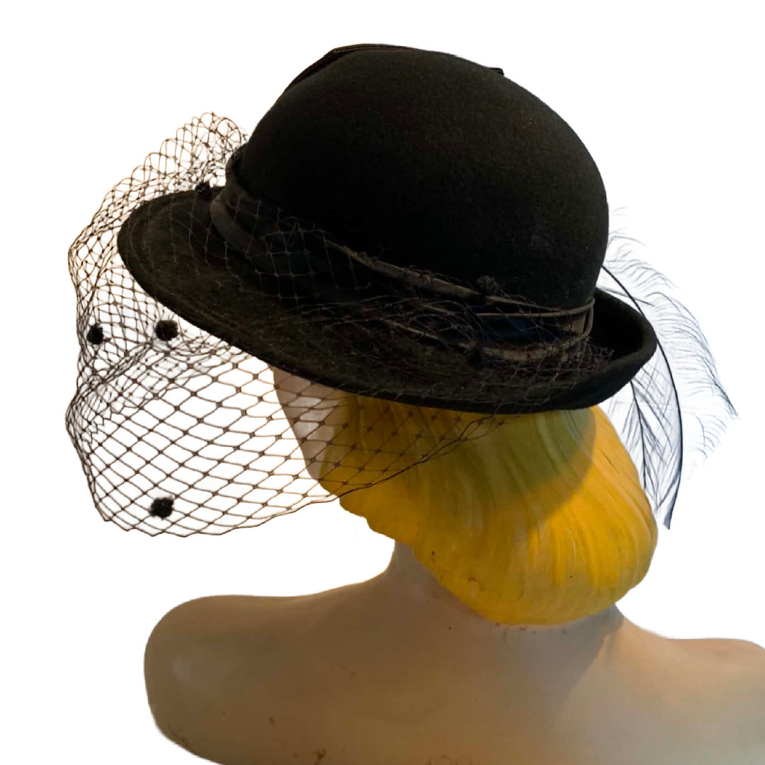 Noir Diva Black Bowler Style Hat with Dotted Netting, Bow and Feather circa 1960s