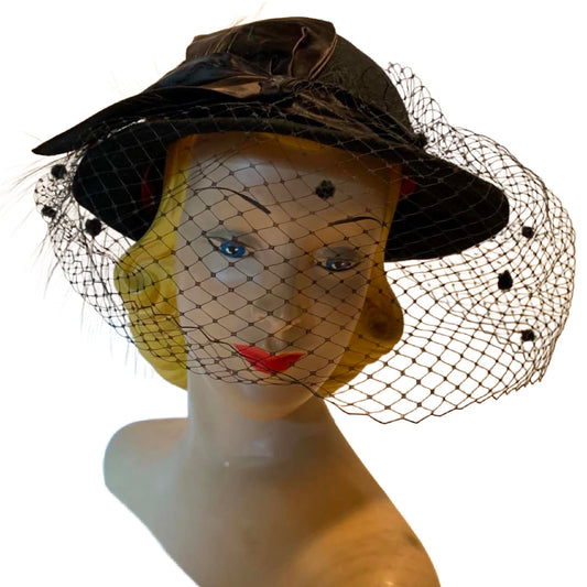 Noir Diva Black Bowler Style Hat with Dotted Netting, Bow and Feather circa 1960s
