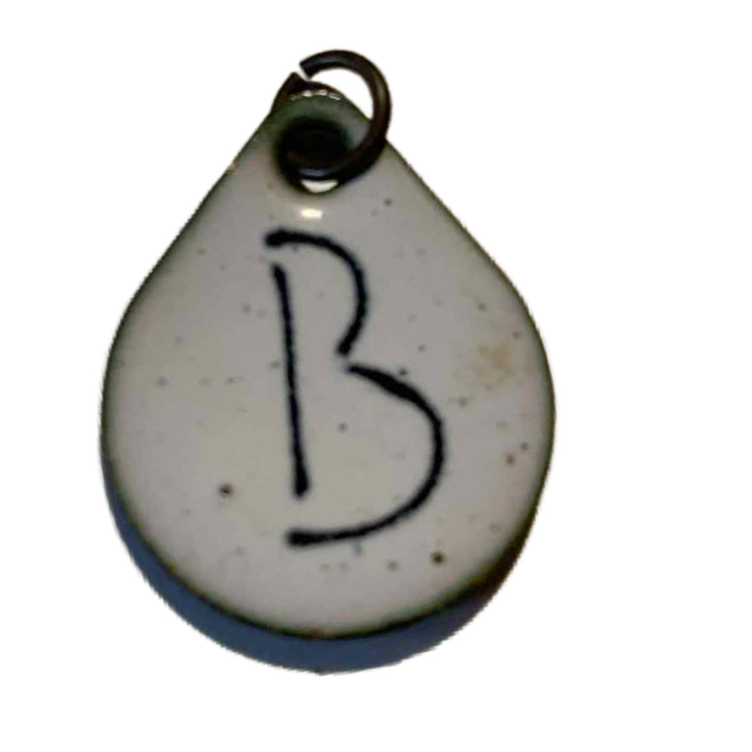 Blood Red Copper Pendant with B on Back circa 1940s