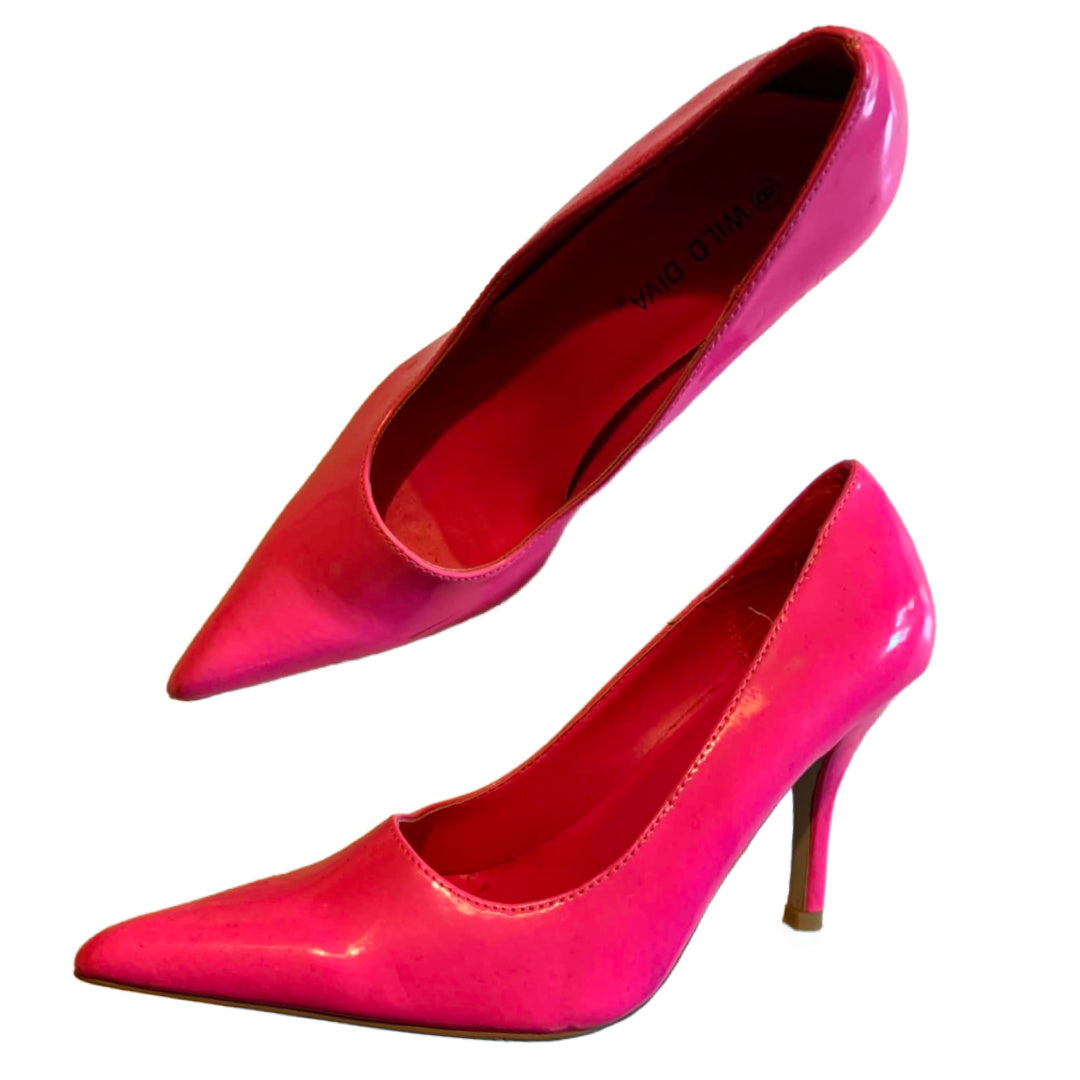 Pair of bright pink high-heeled shoes on a white background