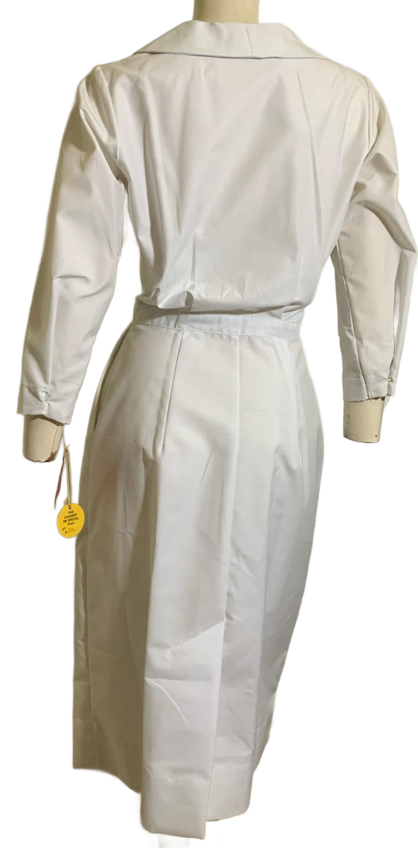 Crisp White Curve Conscious Nurse Uniform with Bow circa 1960s