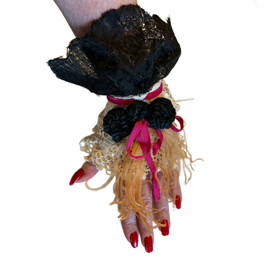 PinkBlack Reimagined Crocheted Lace as Wrist Cuff with Black Lace, Pink Ribbons and Feathers