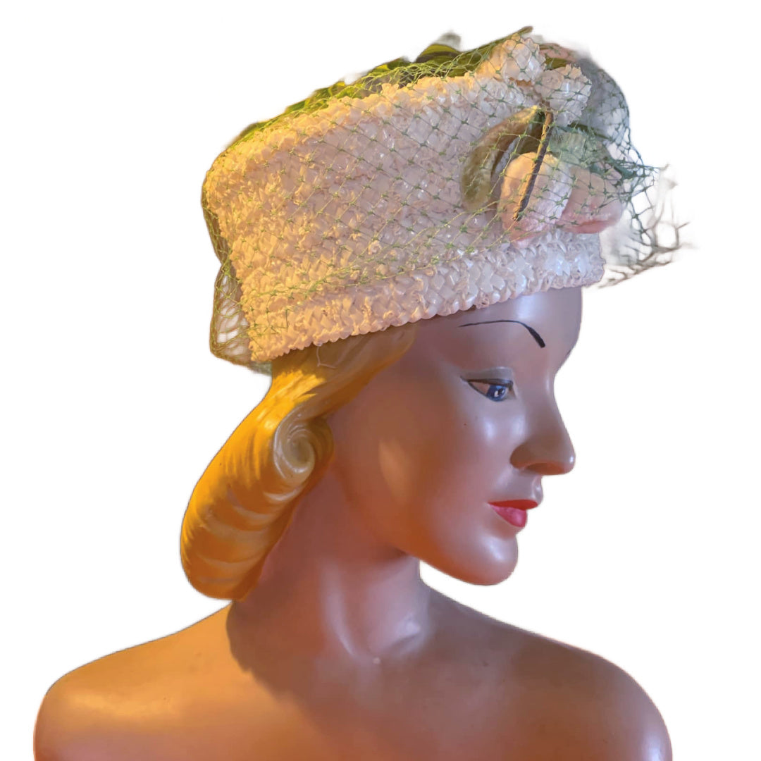 Warm Ivory Braided Sisal Pill Bow Hat with Green Feathers and Iridescent Beads circa 1960s