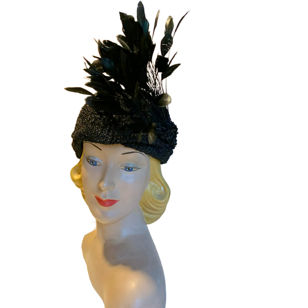Black Bird Reimagined Metallic Turban Style Hat with Antique Feather and Sequin Accent
