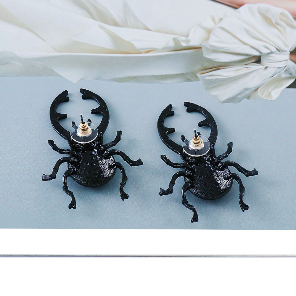 HUGE Surrealist Stag Beetle Earrings Rhinestone Eyes