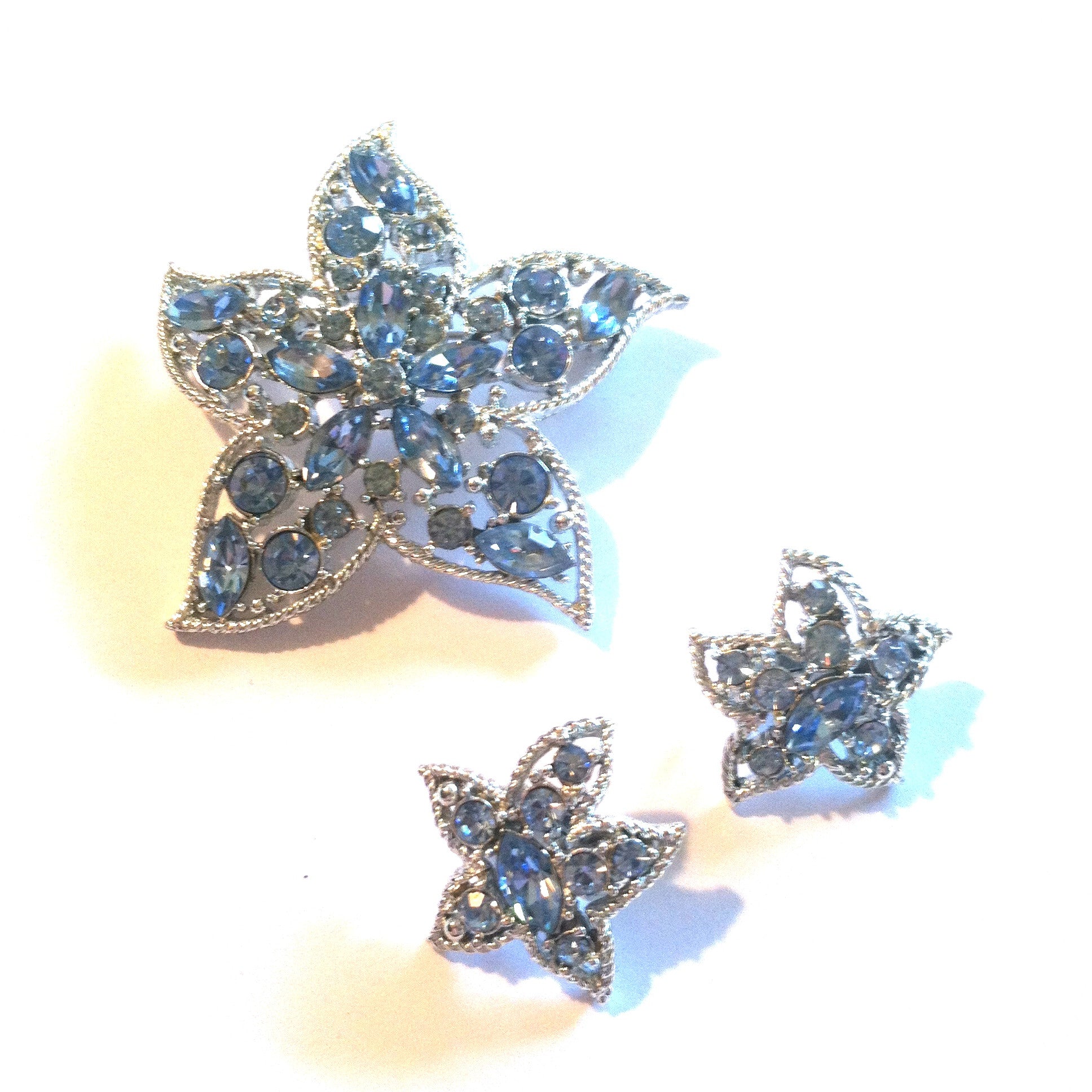 Star Fire Blue Rhinestone Brooch and Clip Earrings circa 1960s Dorothea's Closet Vintage Jewelry Sarah Coventry