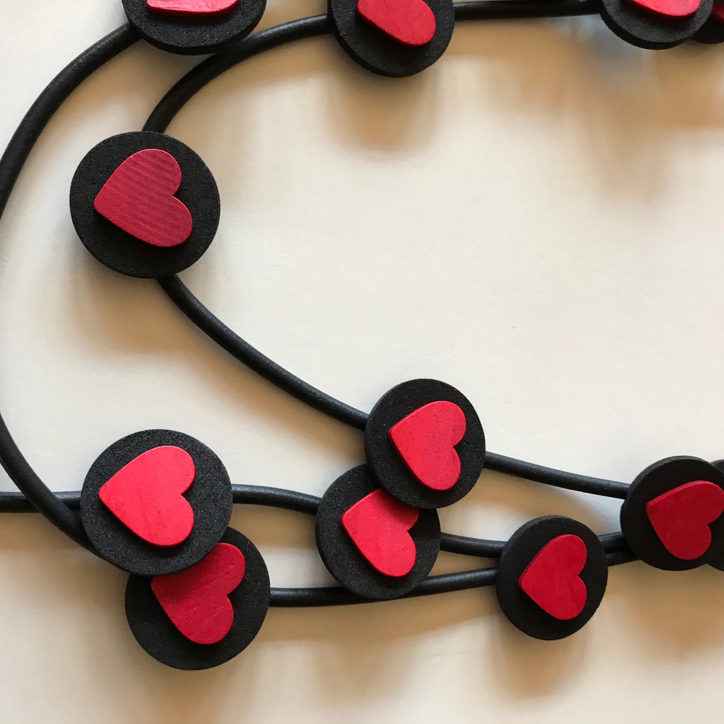 Op-Art Collection Foam Triple Strand Necklace with Red Hearts in Black Dots